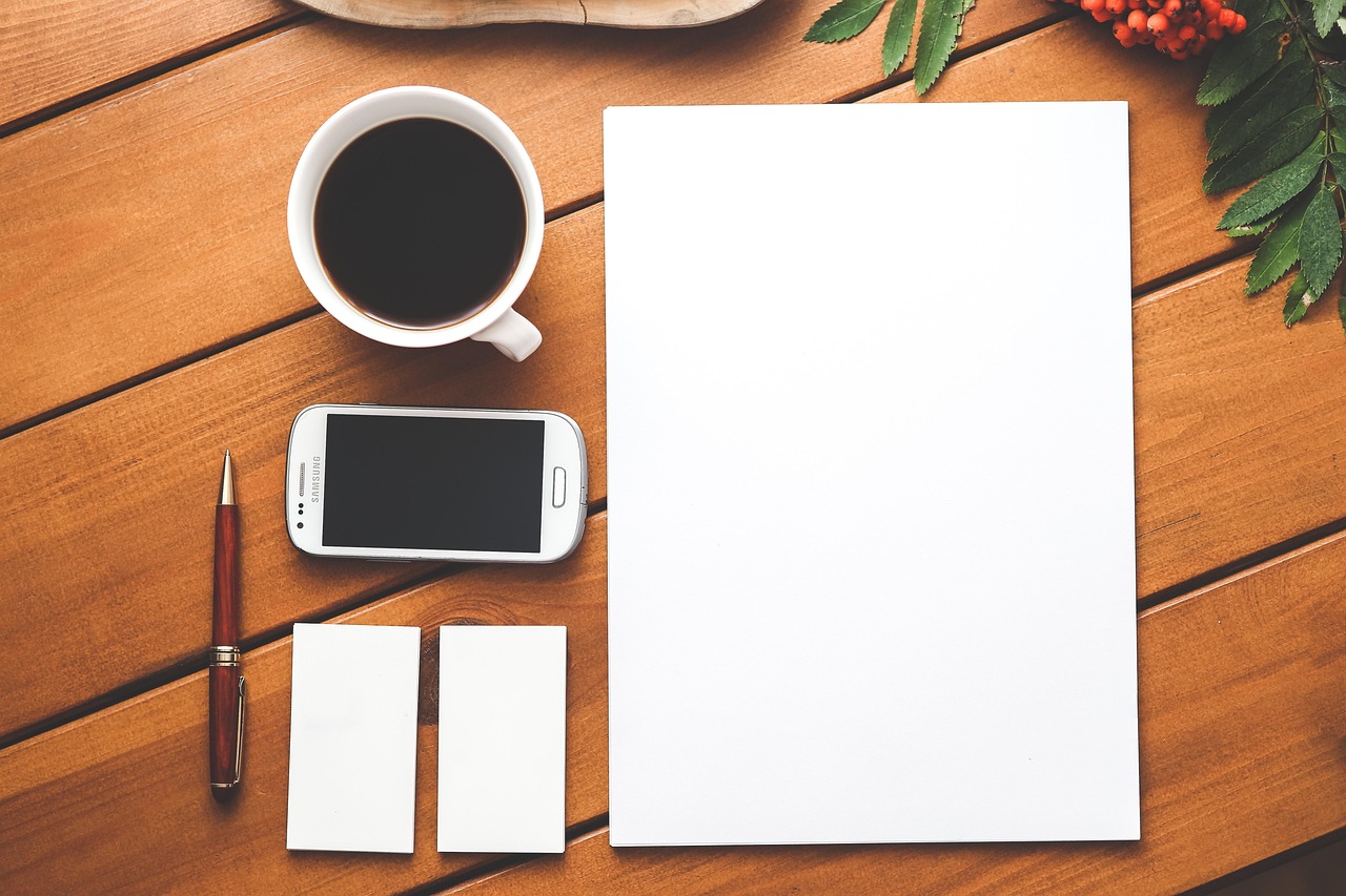 Coffee, phone, paper — How Dr. Austin Harris Enhances Patient Safety Through Intraoperative Echocardiography